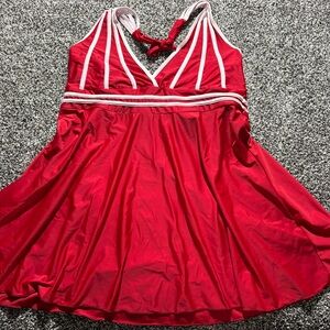 Red swim top  with White Stripes fits like woman’s xl